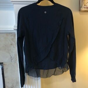 Lululemon quick pace long sleeved shirt with frilly detail in dark moth blue